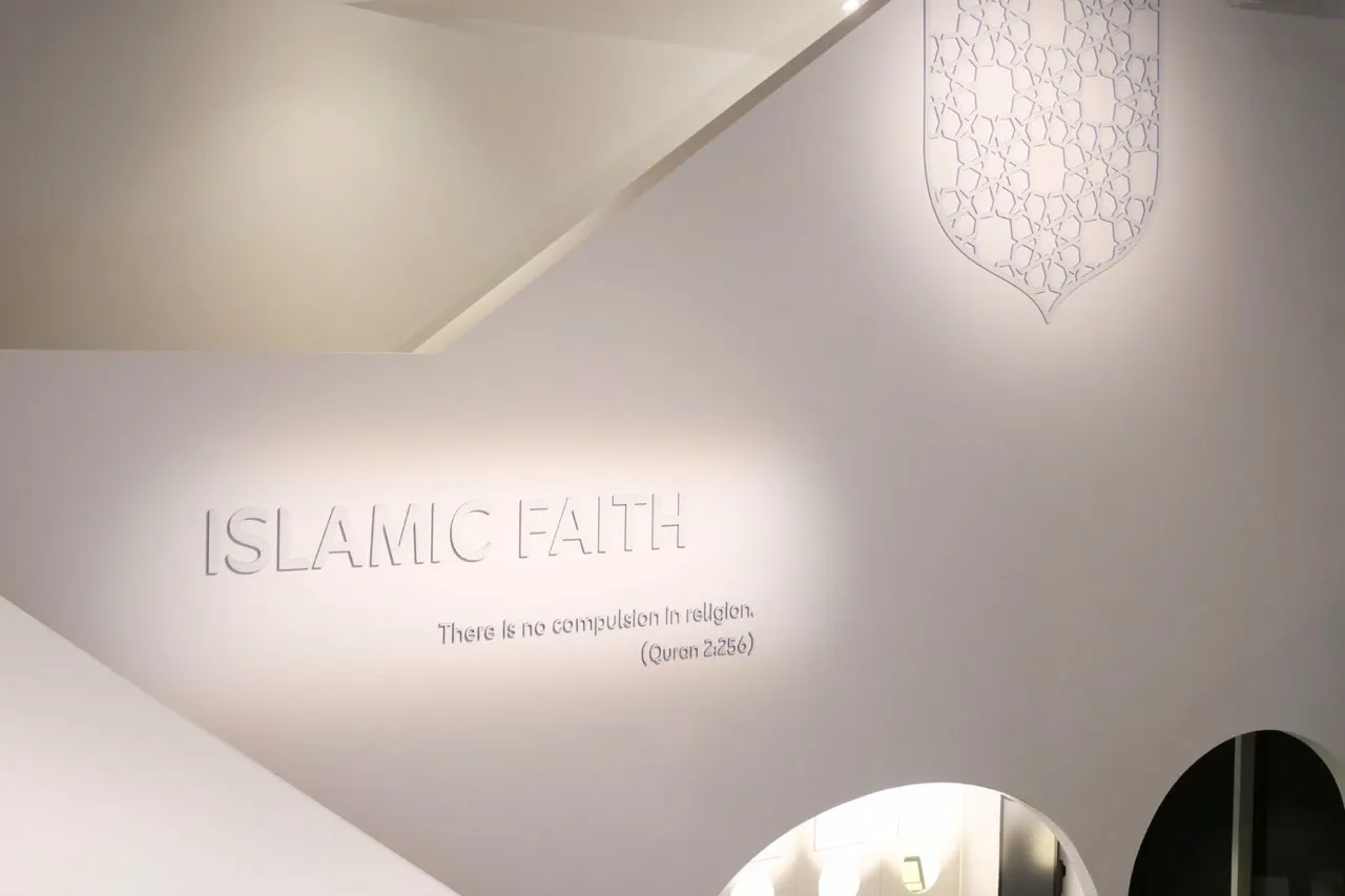 Visitors in the reimagined Islamic Faith gallery